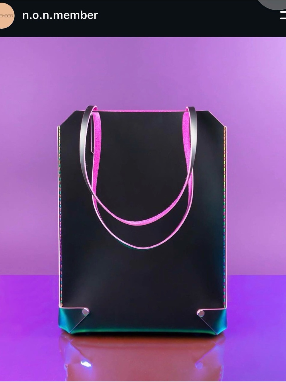 Genuine double sided leather. Black Tote with Pink Handles and interior